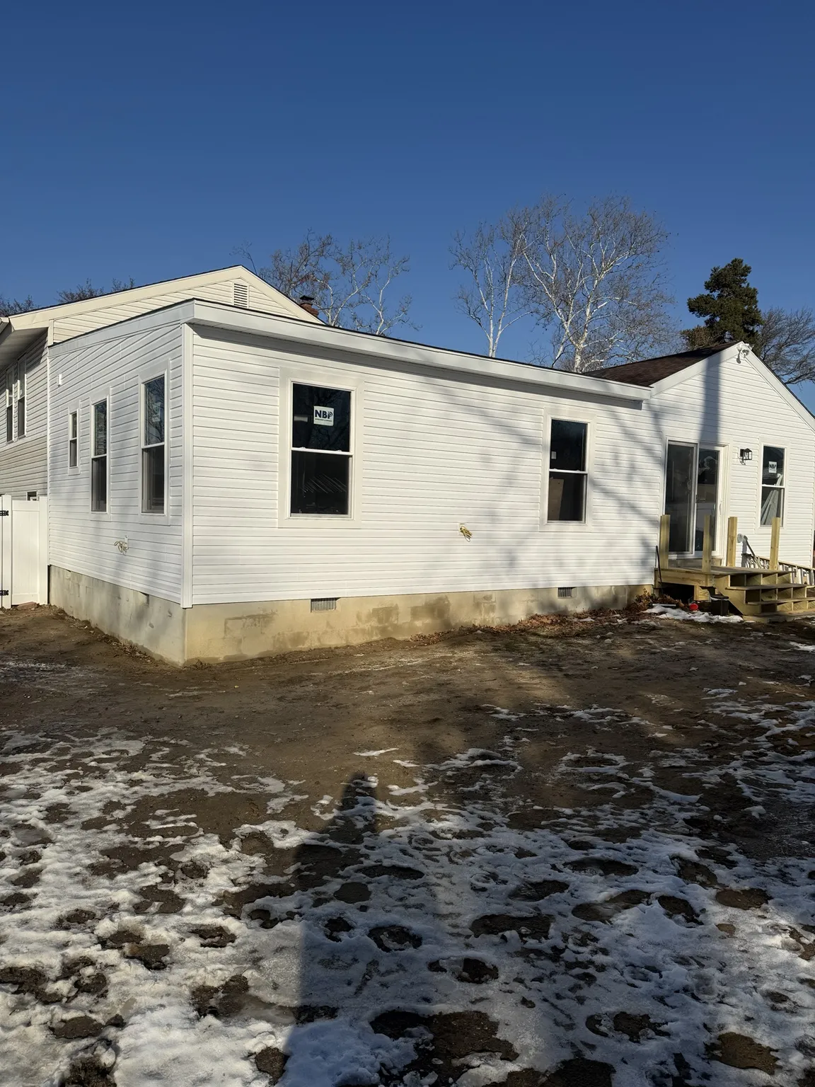 Completed exterior — winter view